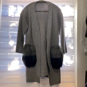 Gray sweater with fur pocket detail